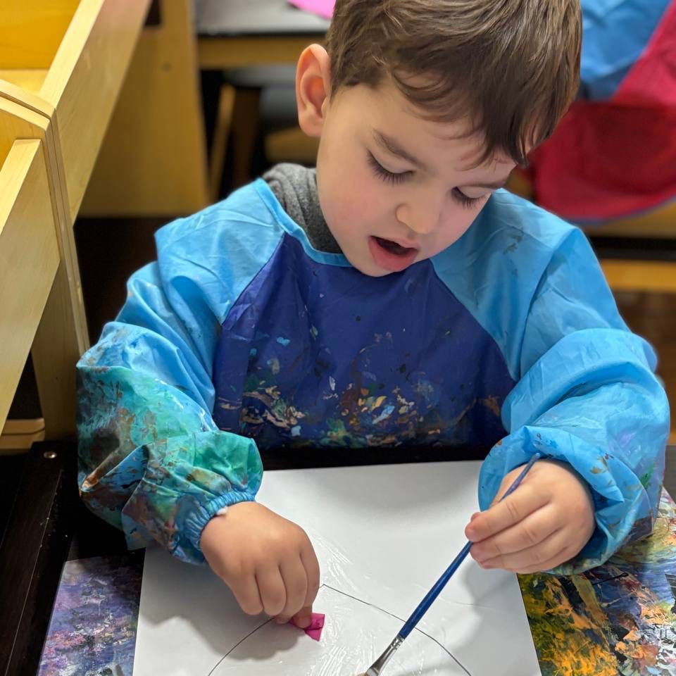 Colorful children's artwork on display at Golden Minds Prep