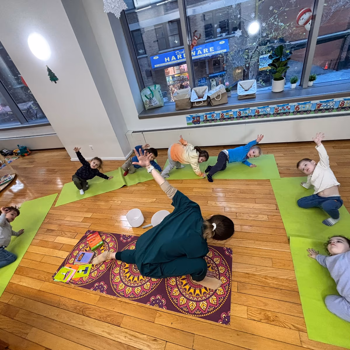 Children practicing yoga at a preschool in Lower Manhattan.