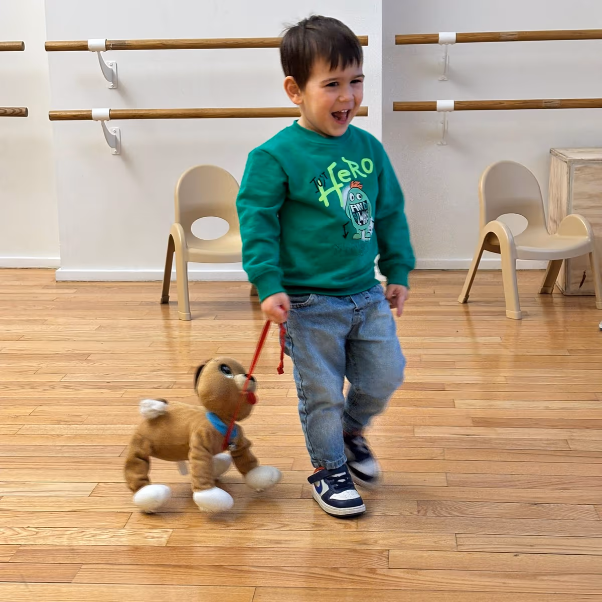 Teacher performing puppet show at Financial District daycare