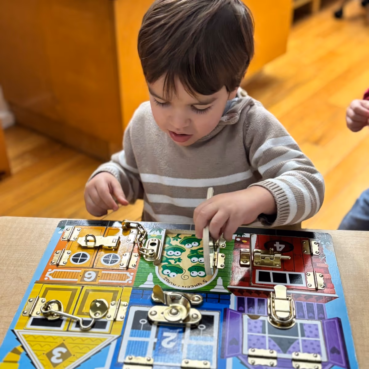 Sensory play area at a daycare in Lower Manhattan with tactile materials.