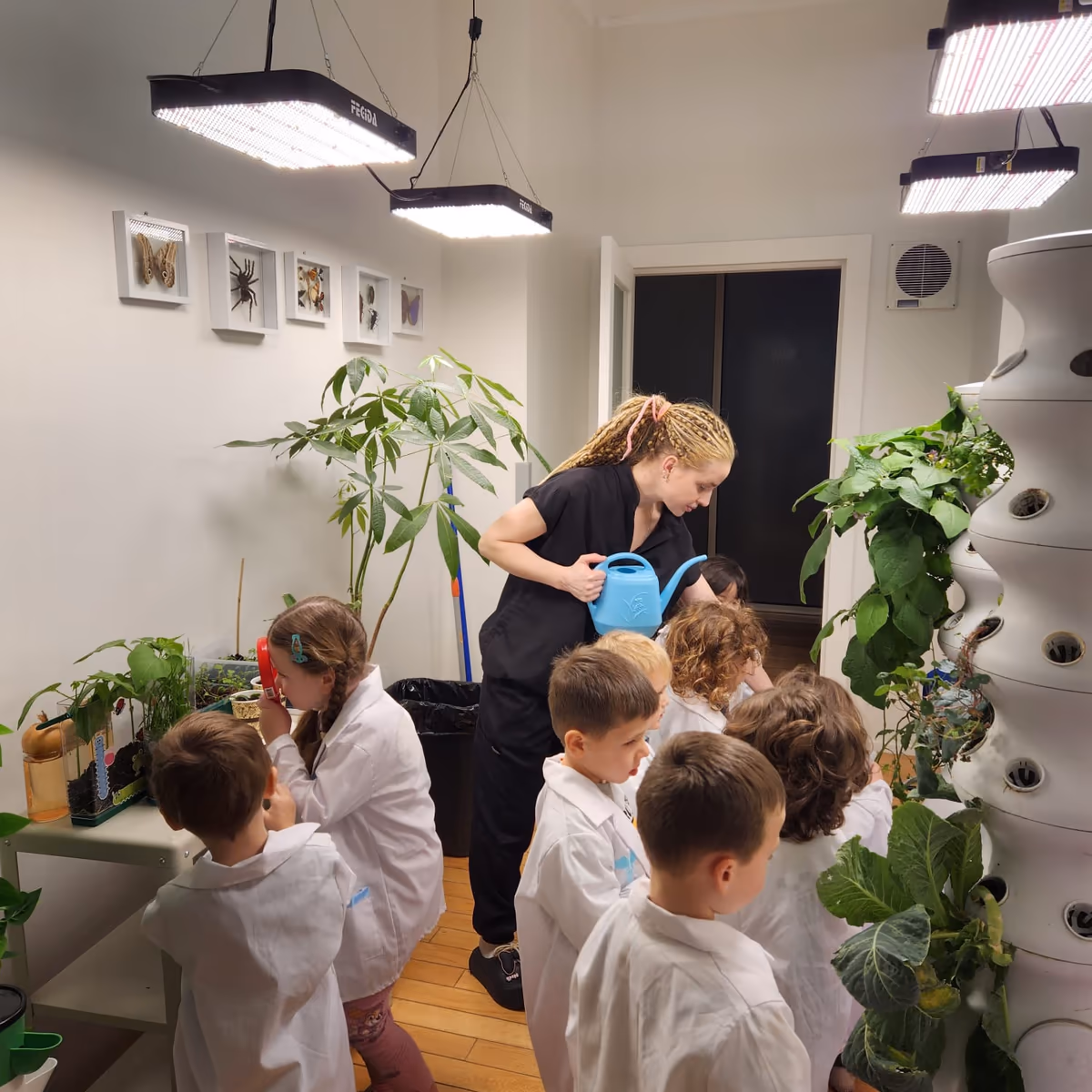 Children gardening in outdoor space at FiDi preschool
